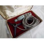 A vintage Cadenza ribbon microphone with stand and lead, boxed.