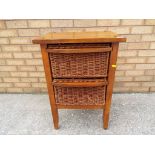 A 2 drawer wicker storage unit approx. 74 cm x 49 cm x 36 cm.