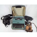 A lot to include an Olivetti portable typewriter, cased, a Fujifilm Finepix S7000 digital camera,