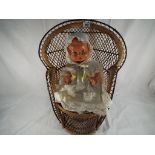 A good quality child's wicker chair with