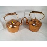 Two antique copper kettles.