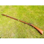 A replica flintlock Kentucky long rifle with working action