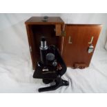 A Watson & Barnet microscope in wooden case.