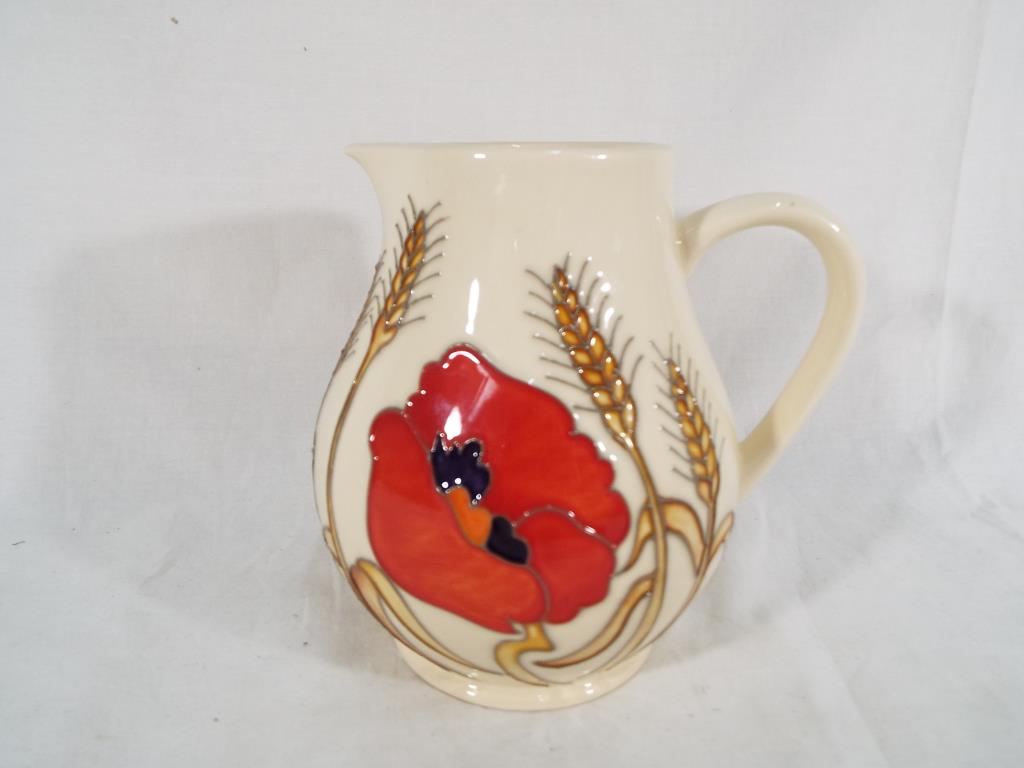 Moorcroft Pottery - a Moorcroft Pottery jug decorated in the Harvest Poppy design, 15. - Image 2 of 2