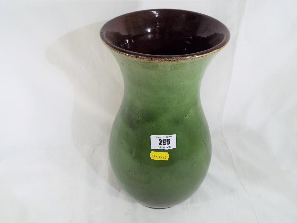 An antique green glazed stoneware vase, approximately 32 cm (h).