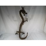 A bronze dragon 76cm (h) Est £30 - £50