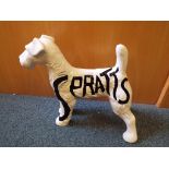 A large pottery dog advertising Spratts dog food Est £60 - £80