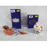 Royal Crown Derby - two paperweights by Royal Crown Derby depicting a pheasant and a squirrel,