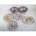 A quantity of English ironstone pottery plates, ashettes and 2 Amhearst Japan ironstone bowls.