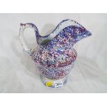 An antique glazed jug, approximately 23 cm (h).