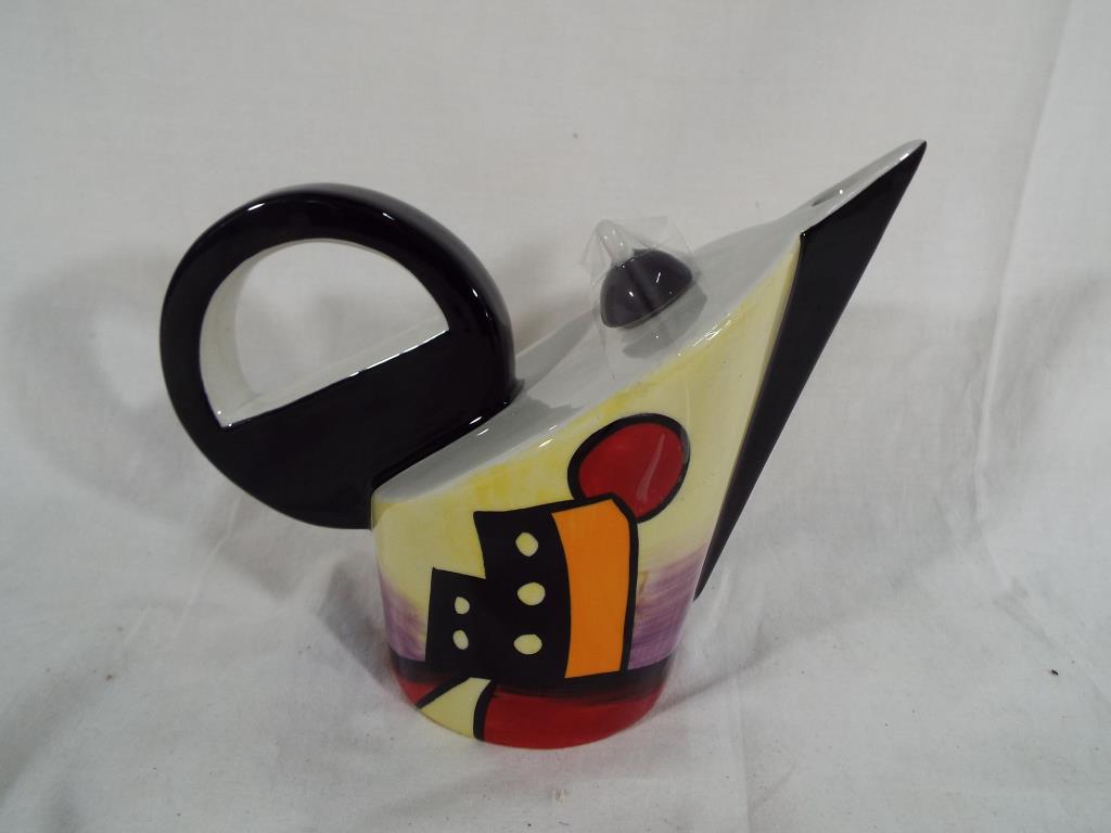 Lorna Bailey - a Lorna Bailey teapot entitled Manhattan in the form of Concord - Est £25 - £45