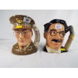 Royal Doulton - two Royal Doulton character jugs D6710 depicting Groucho Marx approximately 18 cm