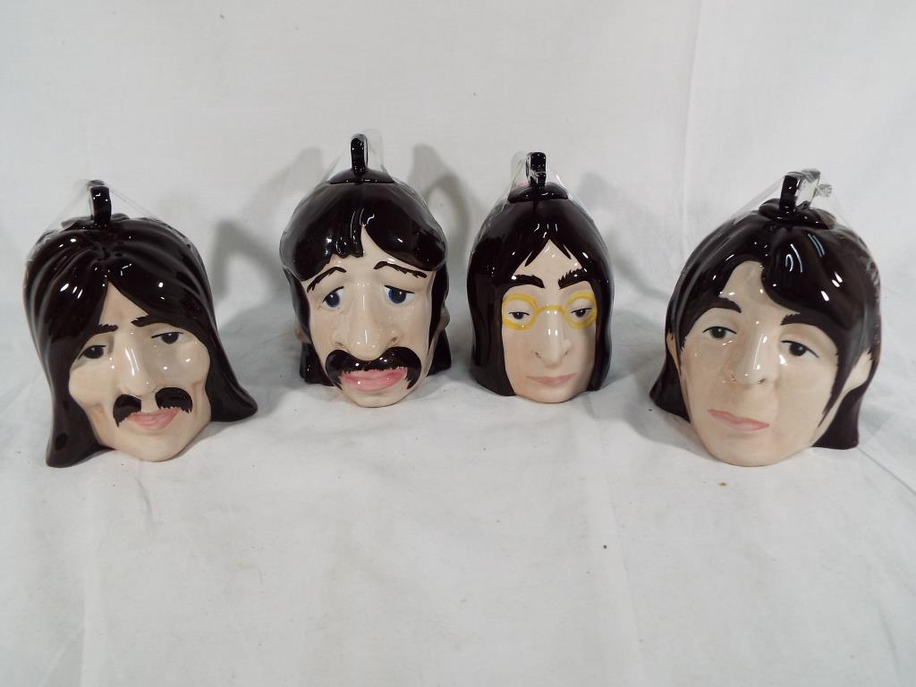 Lorna Bailey - four Lorna Bailey teapots depicting The Beatles heads (4) Est £55 - £75