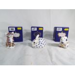 Royal Crown Derby - three paperweights by Royal Crown Derby depicting a rabbit,