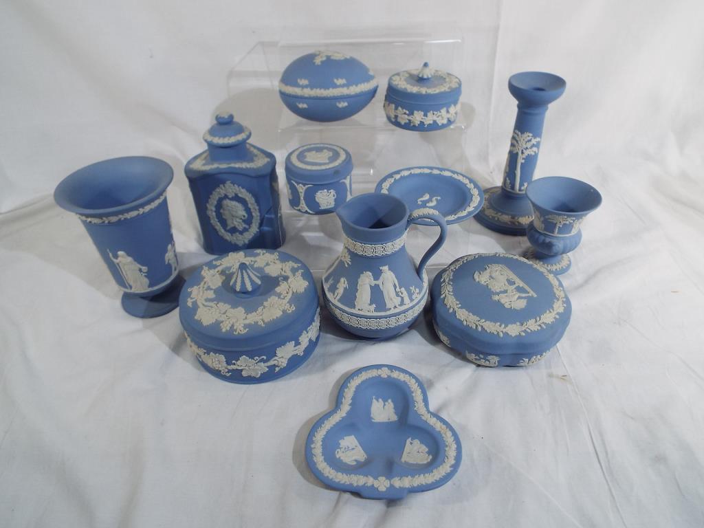Wedgwood Jasper Ware - a collection of twelve ornamental ceramic pieces finished in powder blue to