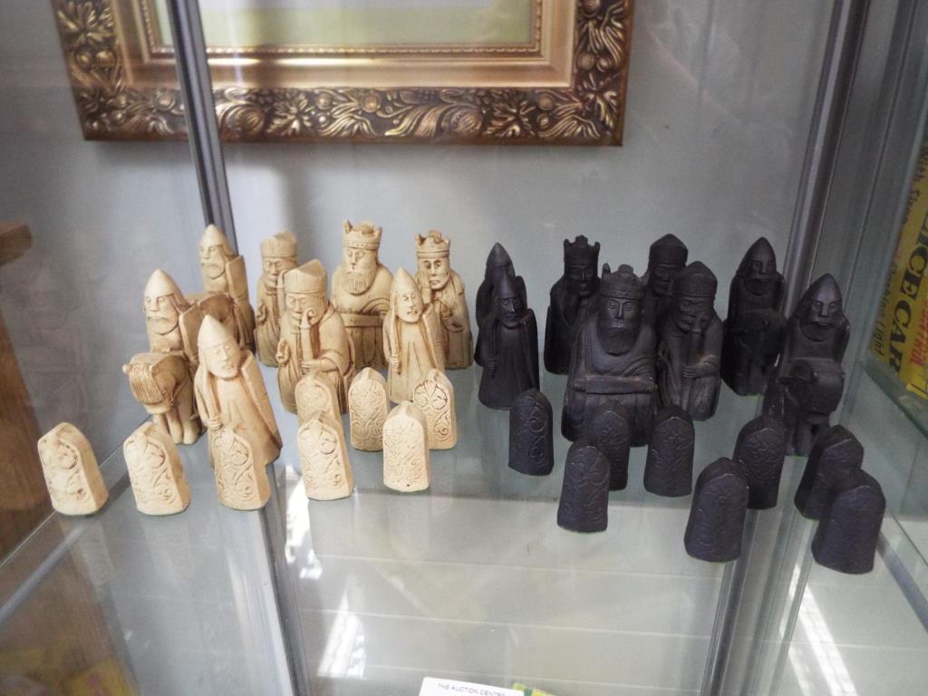 A set of Isle of Lewis chess pieces made from carved saop stone. - Image 2 of 4