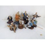 A collection of seven Japanese figurines