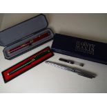 Three fountain pens comprising Harvey Makin white metal pen with cartridge,