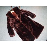 A 3/4 length beaver fur coat by Glamar of London