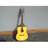 An Indie IA20D 6-string acoustic guitar, mahogany neck, rosewood freeboard, laminated top,