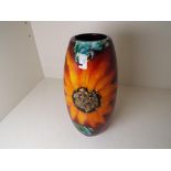 Anita Harris - a baluster vase with modern floral decoration, signed to the base, approx.