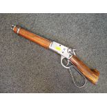 A replica Winchester underlever 'mares leg' rifle with moving underlever action