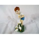 A Royal Worcester figurine entitled Young Farmer marked 3433 to the base, approximate height 17 cm.