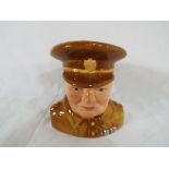 Cartlon Ware - a ceramic Carlton Ware toby jug in the form of Winston Churchill with army uniform.