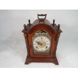 A reproduction George II style mahogany bracket clock by Wuba,