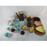 Approximately 40 pieces of Poole pottery tea set items and similar.