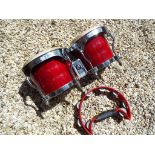 Percussion instruments - a Natal Spirit pair of red bodied Bongos and a Stagg 16-jingle cutaway