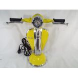 An unusual table lamp in the form of a Vespa scooter 42 cm (h).