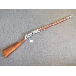 A replica Colt revolving rifle with working action and tamping rod