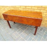 A Victorian mahogany drop leaf table,