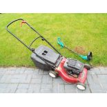 A Mountfield petrol lawn mower model HP470 also included in the lot is a garden strimmer also