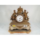 A spelter and alabaster cased French mantel clock, timepiece only,