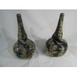 A pair of Doulton Lambeth salt glazed twist vases circa 1890 - 1910.