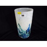 An opaque and mother of pearl coloured effect decorative glass vase, 27 cm (h).