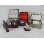 Three boxed tourist ware collectables including models of the Terracotta Warriors,