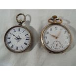 Two pocket watches, one marked 0.