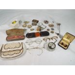 Four pairs of early 20th century metal framed spectacles of which two cased,