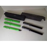 Lamy Safari - a green pen, pencil and rollerball writing set, and a black pen and rollerball set,