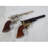 Two replica single action Colt pistols