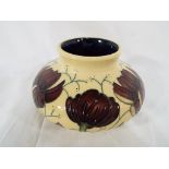 Moorcroft - a ceramic Moorcroft vase decorated in the Chocolate Cosmos pattern,