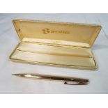 Sheaffer - a vintage yellow metal propelling pencil in original case