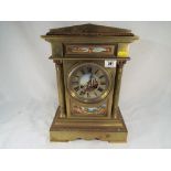 A good brass cased mantel clock,