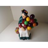 Royal Doulton - an early figurine depicting The Old Balloon Seller # HN 1315, approx.