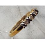 A lady's 9 carat gold 10 pt diamond three stone kiss ring, size ­_, approx weight 1.