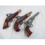 Three replica pistols to include two Spanish flintlocks and a Colt army percussion pistol