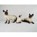 3 Beswick figurines of Siamese cats, 1 marked 1559 to the base,